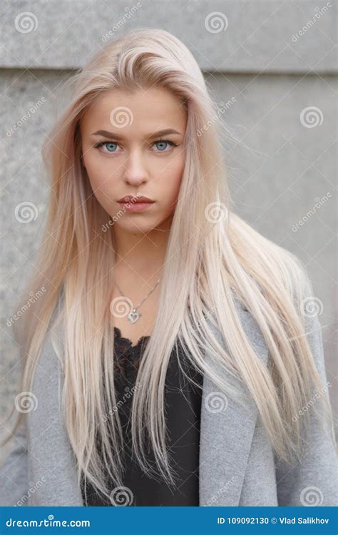 Blonde blue eyed female model Stock Photos and。